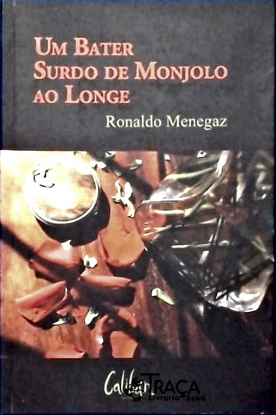 Um Bater Surdo De Monjolo Ao Longe